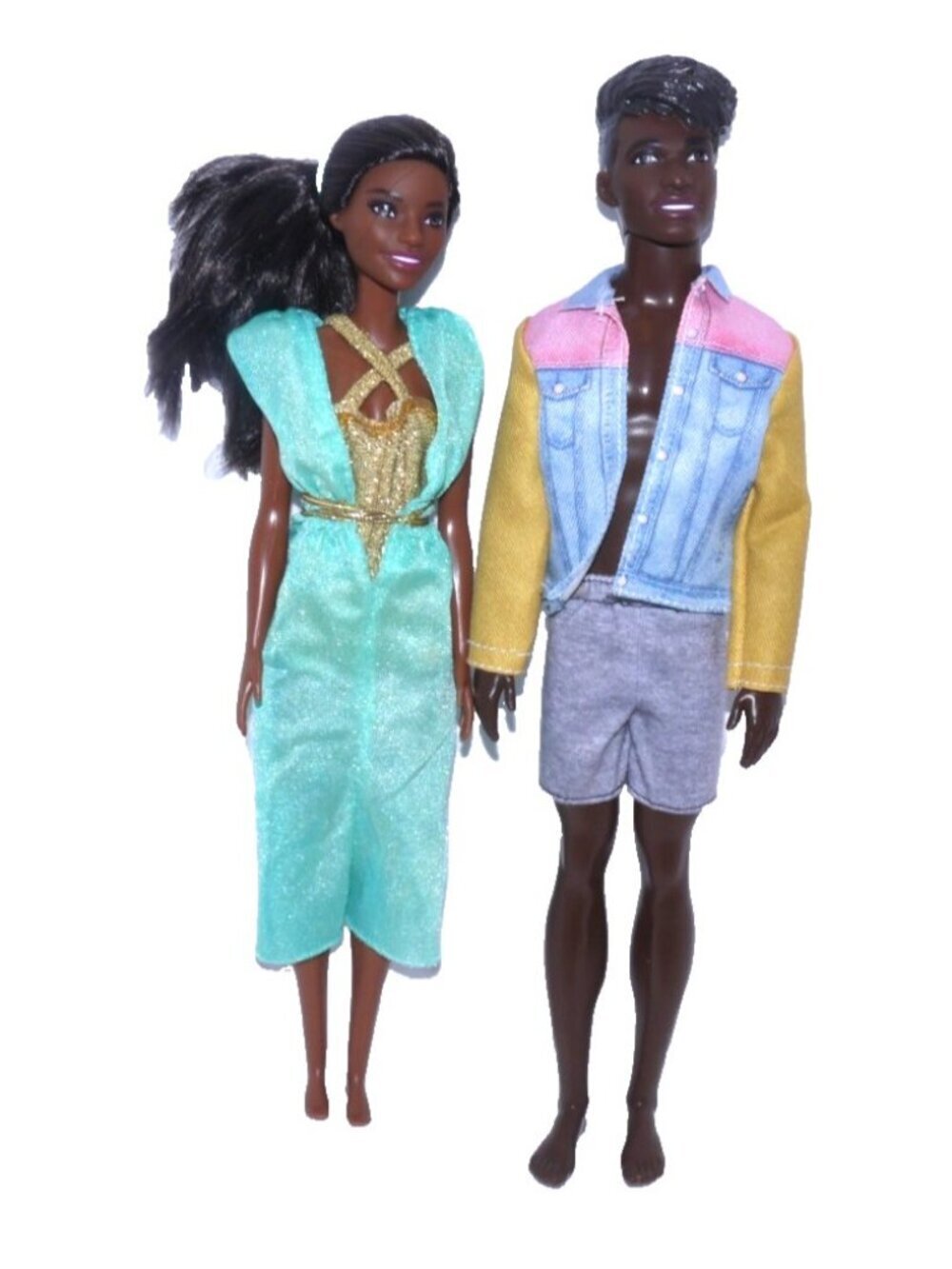 Barbie set of two dolls clothes do not match dolls and some may be vintage As Is